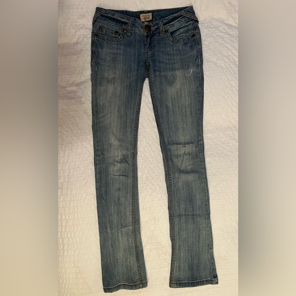 Free people thin denim jeans with flare at bottom. Size 24 good worn condition